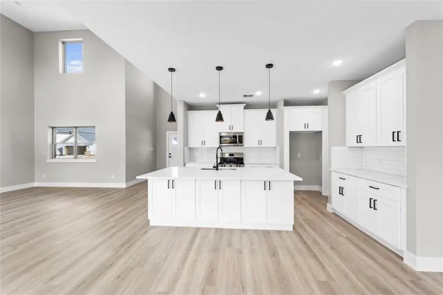 Furnished interior view inside a new home in , Spring (Image 4). Furnished interior view inside a new home in , Spring (Image 4).