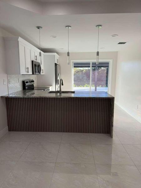 Furnished interior view inside a new home in , West Palm Beach (Image 9). Furnished interior view inside a new home in , West Palm Beach (Image 9).