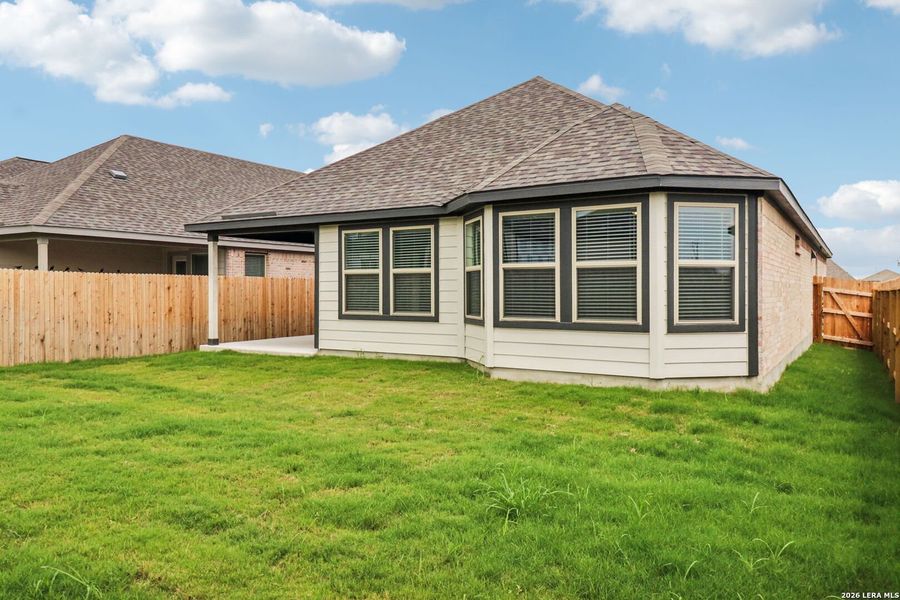 Exterior details and patio area of a home in Kallison Ranch, San Antonio (Image 28).