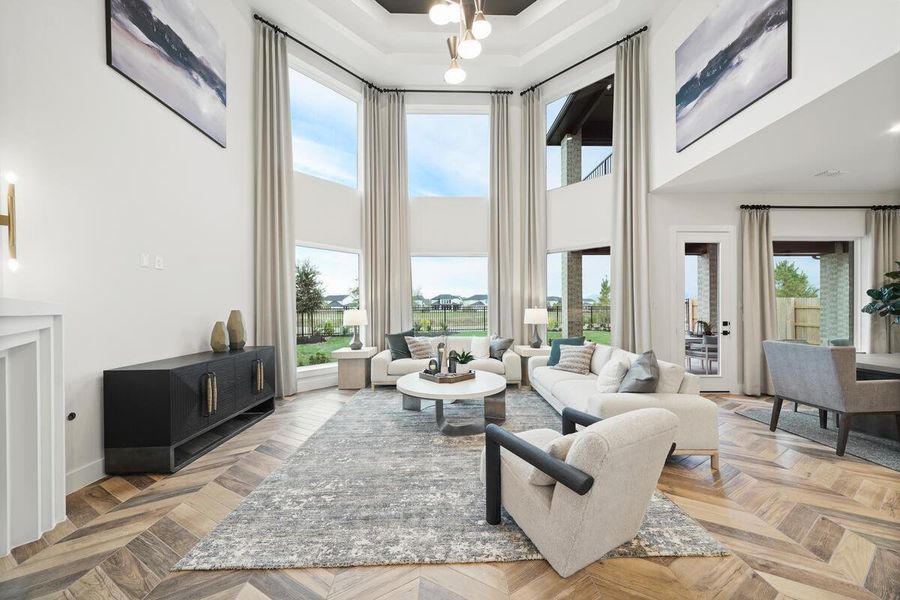 Soaring ceilings that bring plenty of light into your spacious living area. Representative image.