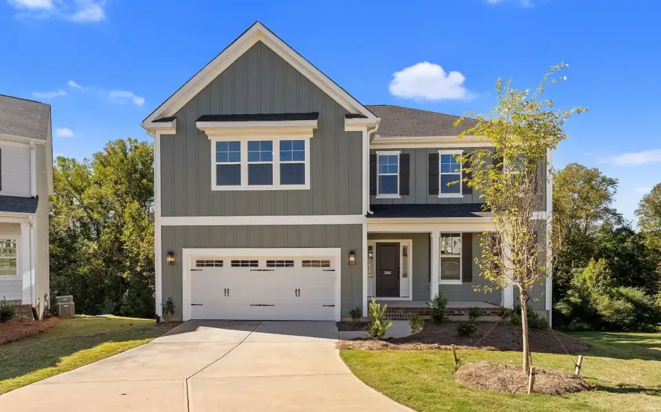 Front exterior of a new home in Parris Meadows, Chesnee, SC, highlighting curb appeal (Image 1). Front exterior of a new home in Parris Meadows, Chesnee, SC, highlighting curb appeal (Image 1).
