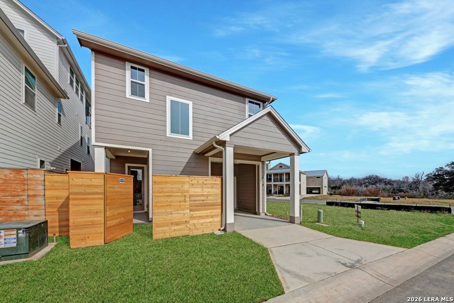 Exterior details and patio area of a home in Town Creek, New Braunfels (Image 19).