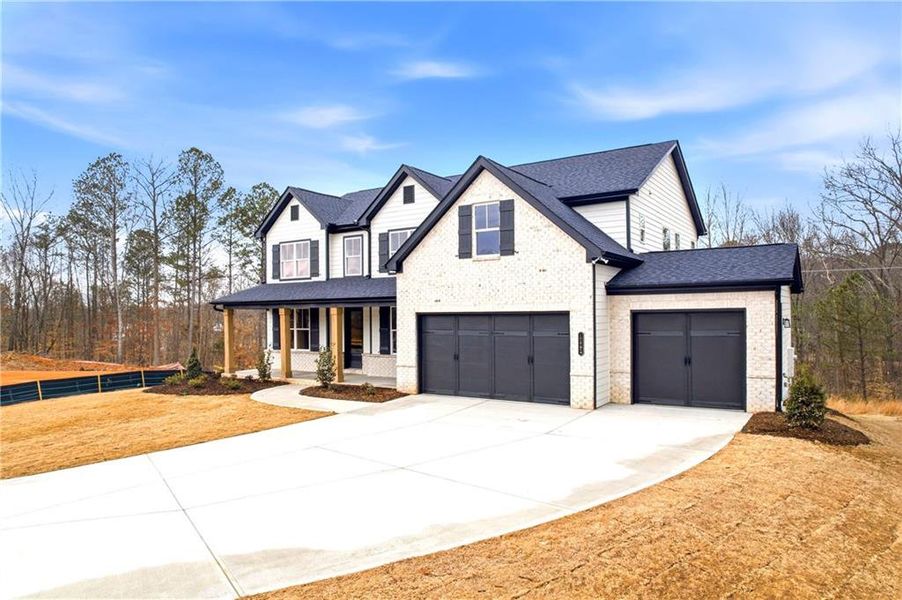 Front exterior of a new home in Sterlington, Canton, GA, highlighting curb appeal (Image 23).