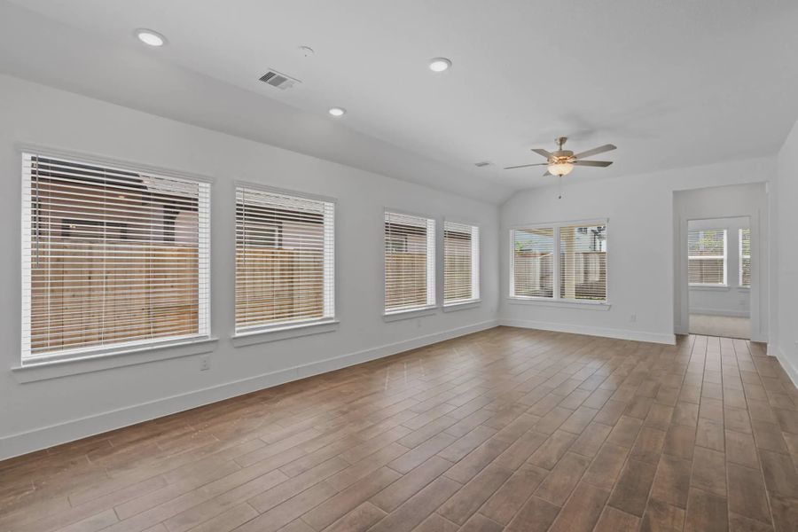 Representative unfurnished interior of a home built from the Carriagehouse by Chesmar Homes in Meridiana Townhomes, Iowa Colony (Image 26).