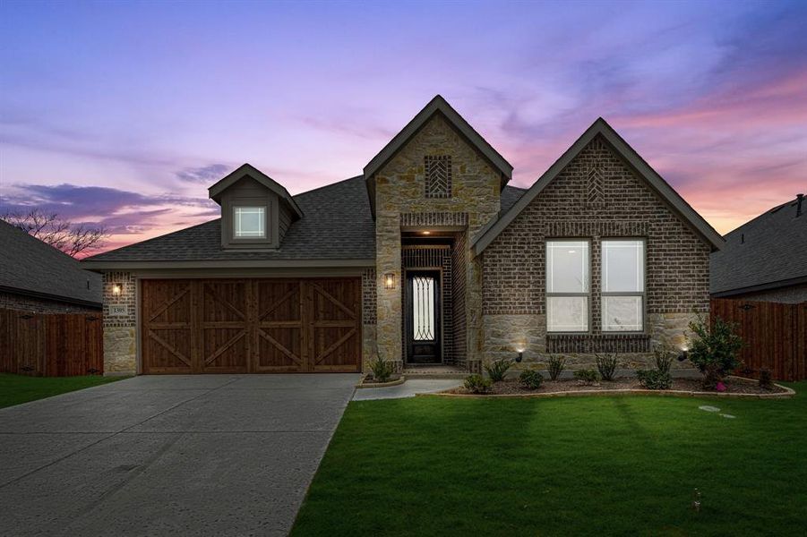 Front exterior of a new home in The Oaks, Red Oak, TX, highlighting curb appeal (Image 21). Front exterior of a new home in The Oaks, Red Oak, TX, highlighting curb appeal (Image 21).