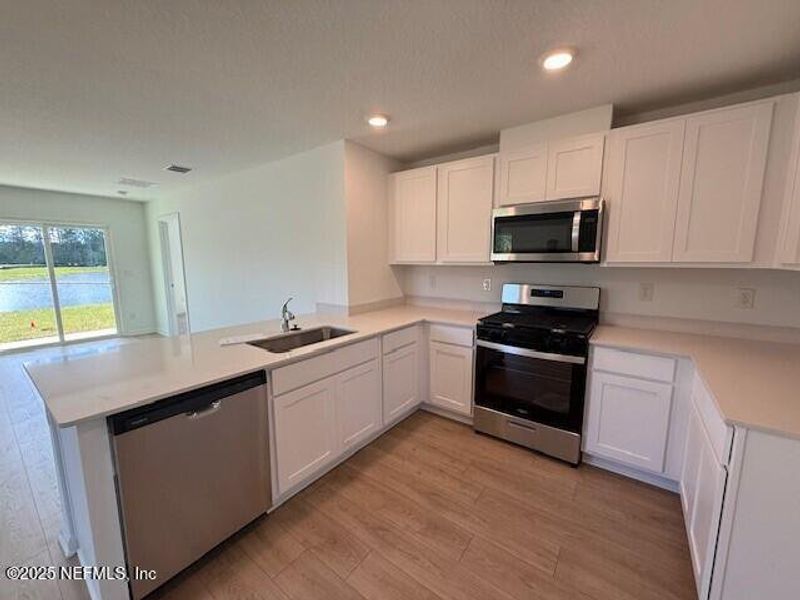 Furnished interior view inside a new home in Grand Reserve, Bunnell (Image 19).