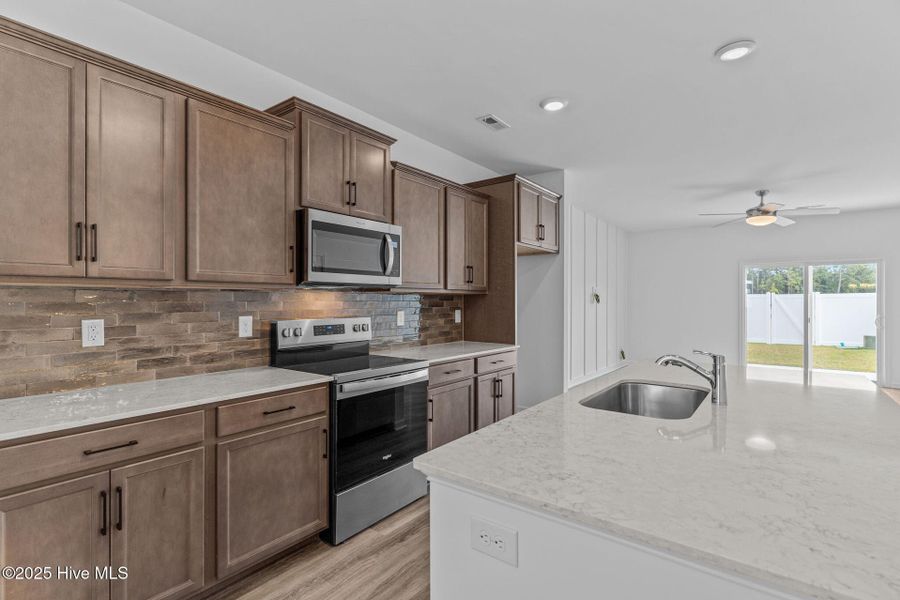 Furnished interior view inside a new home in Coastal Haven Townes, Leland (Image 5).
