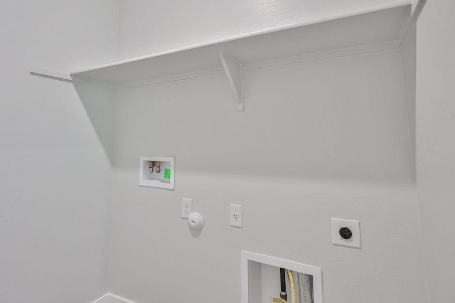 A white ceiling with a light fixture. A white ceiling with a light fixture.