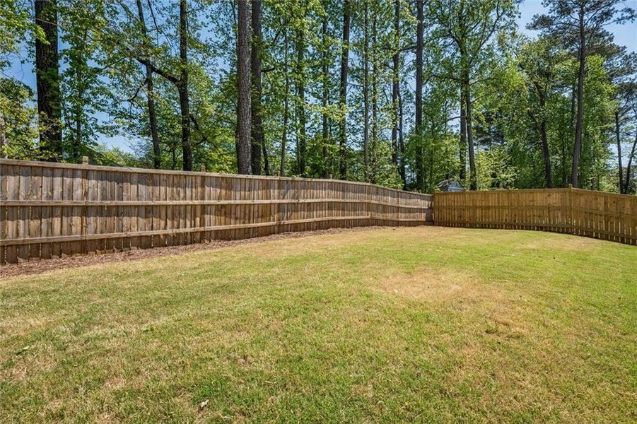 Exterior details and patio area of a home in The Enclave on Lavista, Tucker (Image 26). Exterior details and patio area of a home in The Enclave on Lavista, Tucker (Image 26).