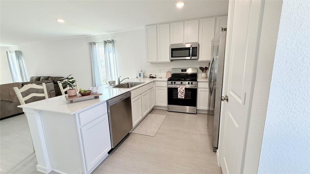 Furnished interior view inside a new home in Tavola: Cottage Collection, New Caney (Image 11). Furnished interior view inside a new home in Tavola: Cottage Collection, New Caney (Image 11).