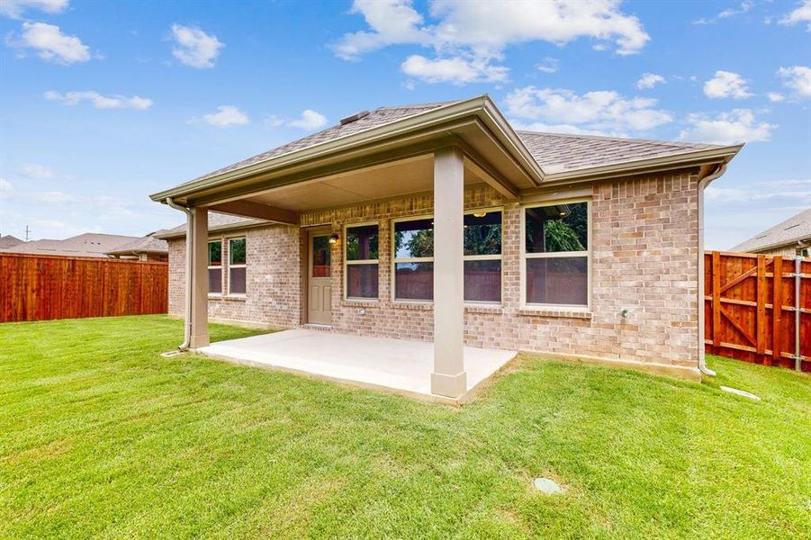 Front exterior of a new home in Kings Way, Denton, TX, highlighting curb appeal (Image 17). Front exterior of a new home in Kings Way, Denton, TX, highlighting curb appeal (Image 17).