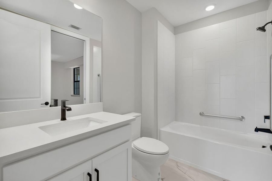 Furnished interior view inside a new home in Esplanade by the Islands Coach Homes, Naples (Image 7). Furnished interior view inside a new home in Esplanade by the Islands Coach Homes, Naples (Image 7).