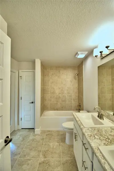 Furnished interior view inside a new home in Cadence Crossing, Auburndale (Image 8). Furnished interior view inside a new home in Cadence Crossing, Auburndale (Image 8).