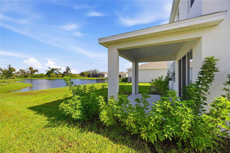Exterior details and patio area of a home in Coddington, Bradenton (Image 32).