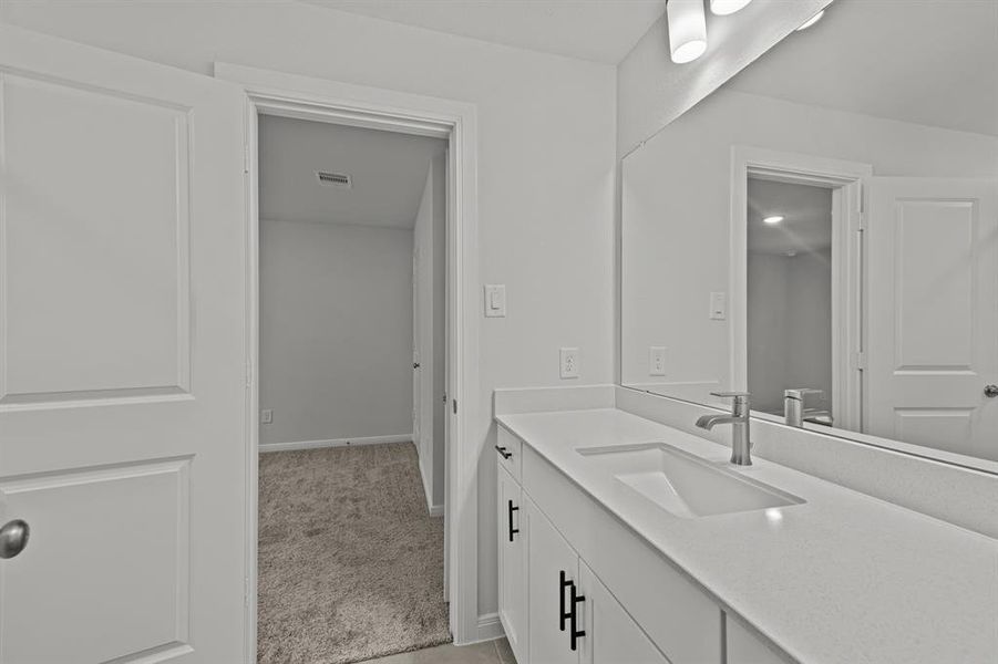 Furnished interior view inside a new home in The Woodlands Hills 45', Willis (Image 5). Furnished interior view inside a new home in The Woodlands Hills 45', Willis (Image 5).