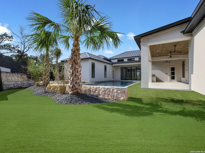 Exterior details and patio area of a home in , San Antonio (Image 33).