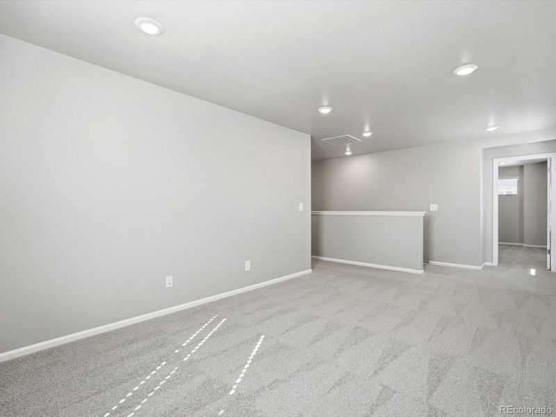 Spacious, unfurnished interior of a new home in Buffalo Highlands: The Flora Collection, Commerce City (Image 21).