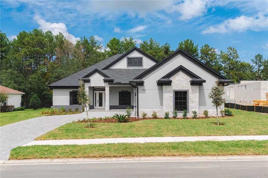 Front exterior of a new home in , Brooksville, FL, highlighting curb appeal (Image 27).