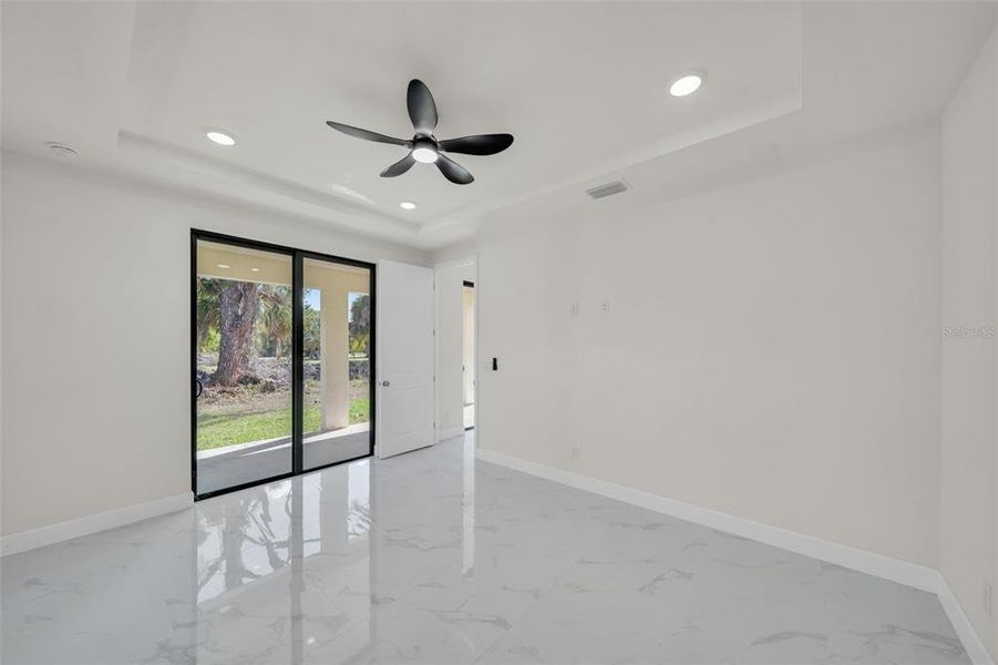 Spacious, unfurnished interior of a new home in , Port Charlotte (Image 18).