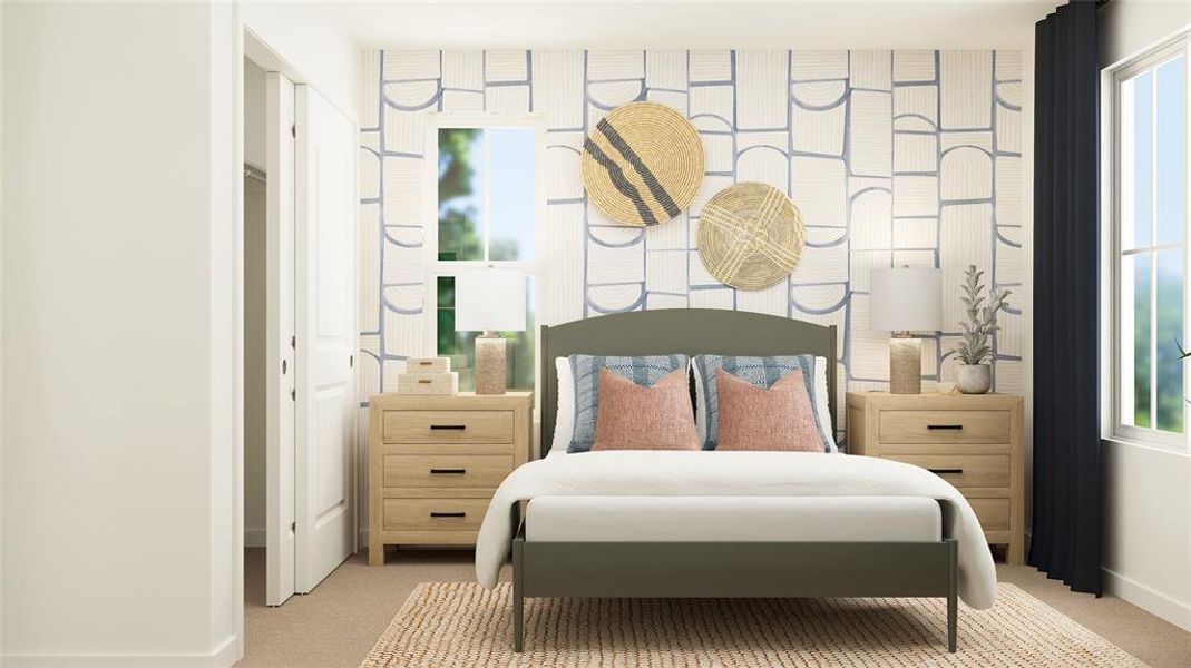 Bedroom featuring light colored carpet and baseboards