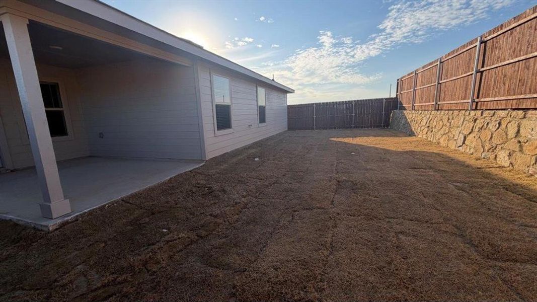 Exterior details and patio area of a home in Hickory Grove, Krum (Image 2).