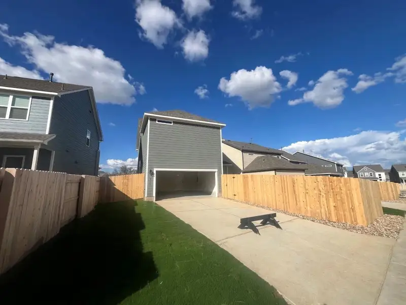 Exterior details and patio area of a home in Lariat, Liberty Hill (Image 3).