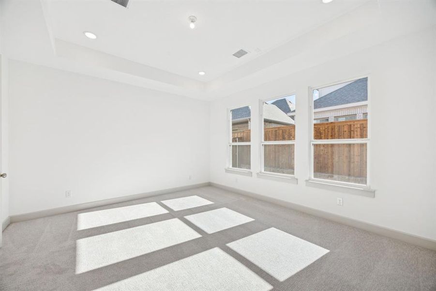 Peaceful and relaxing, your new owner's suite is tucked away at the rear of the home for additional privacy.