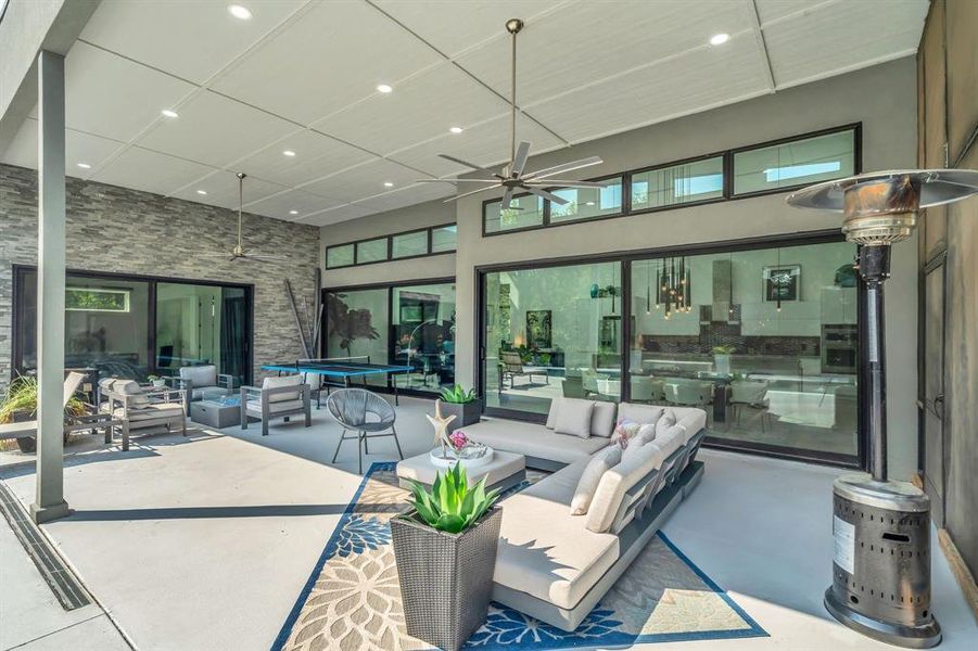 View of patio / terrace with outdoor lounge area and ceiling fan