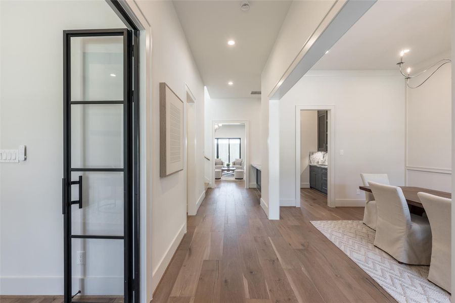 A restrained yet intentional entry by Holland Fine Homes where natural light, clean lines, and thoughtful proportion create a quiet, welcoming arrival.