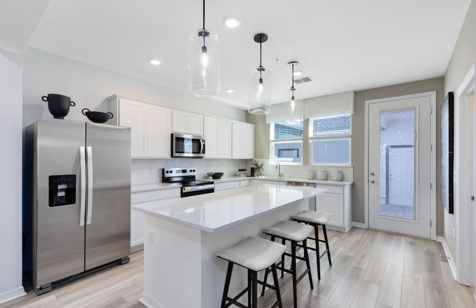 Representative furnished interior of a home built from the Foxtail - Interior Unit by Pulte Homes in Silverleaf Oaks, Winter Garden (Image 6).