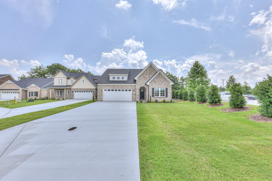 Front exterior of a new home in Legacy Preserve, Tullahoma, TN, highlighting curb appeal (Image 2). Front exterior of a new home in Legacy Preserve, Tullahoma, TN, highlighting curb appeal (Image 2).