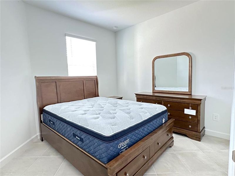 Furnished interior view inside a new home in Palm Lake at Coco Bay, Englewood (Image 17).