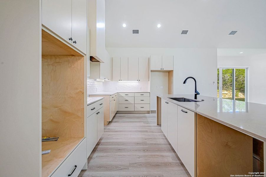 Furnished interior view inside a new home in , Fischer (Image 6).