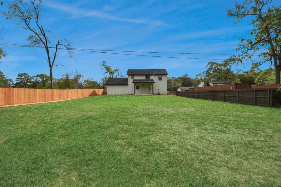 Exterior details and patio area of a home in , Spring (Image 21).