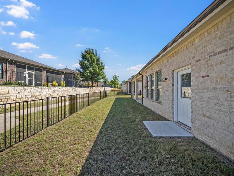 Exterior details and patio area of a home in , McKinney (Image 16).