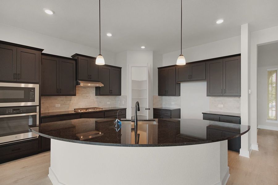Representative furnished interior of a home built from the Maddy by Chesmar Homes in Highland Village, Georgetown (Image 3).