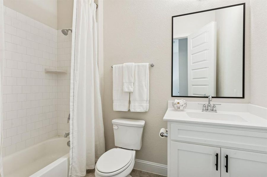 Full ensuite bath off guest bedroom downstairs Full ensuite bath off guest bedroom downstairs