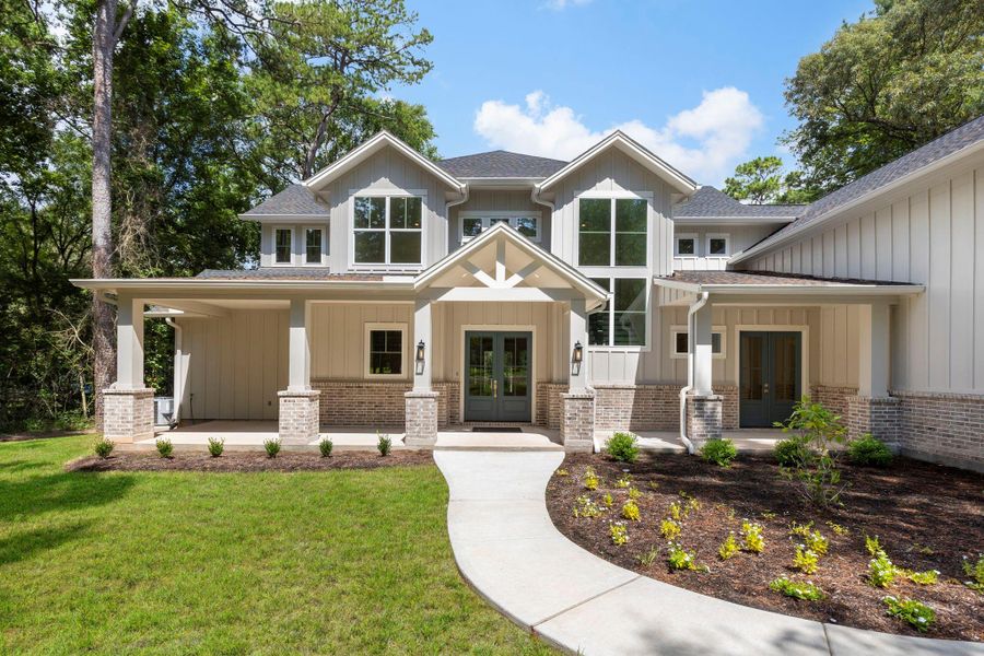 Gracious front porch welcomes you home. Gracious front porch welcomes you home.