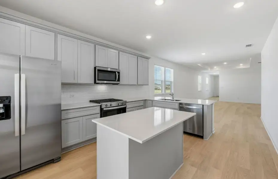 Furnished interior view inside a new home in Larson Crossing, Elgin (Image 4).