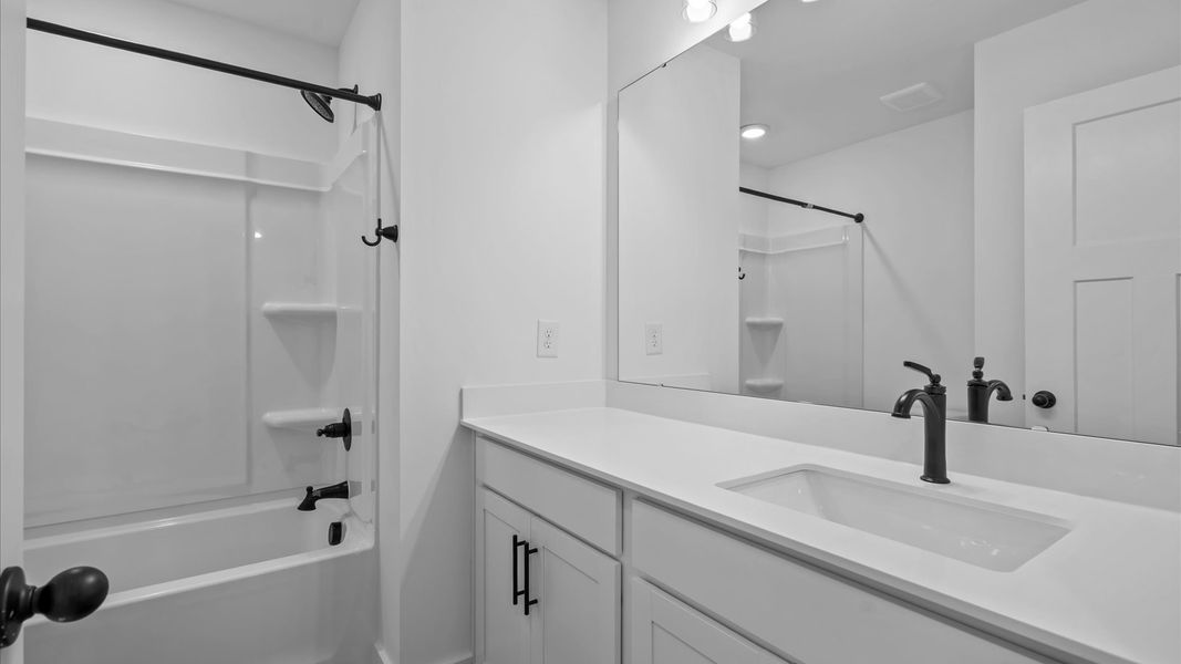 Accomplished full bath designed with both comfort and sophistication in mind