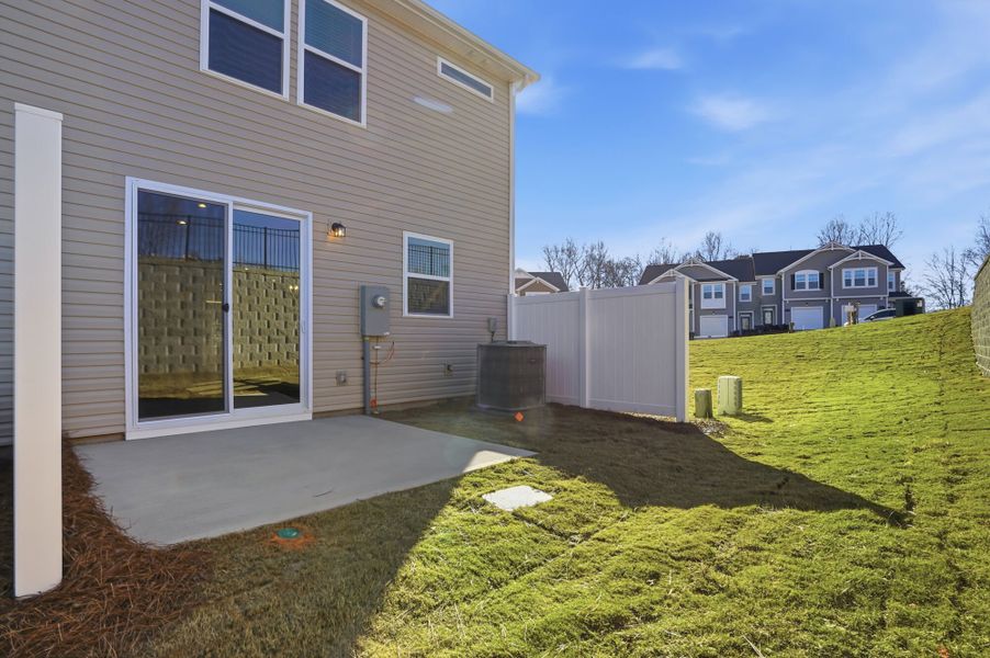 Exterior details and patio area of a home in Hedgecliff Townes, Kannapolis (Image 15).