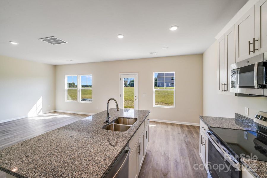 Furnished interior view inside a new home in , Statesville (Image 14).
