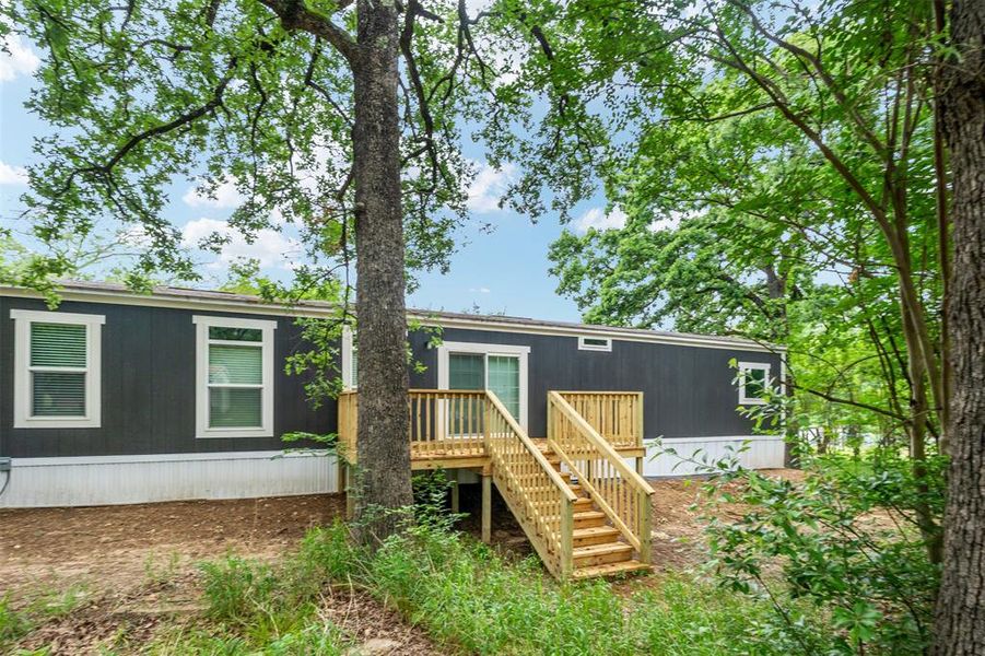 Front exterior of a new home in , Mabank, TX, highlighting curb appeal (Image 2). Front exterior of a new home in , Mabank, TX, highlighting curb appeal (Image 2).