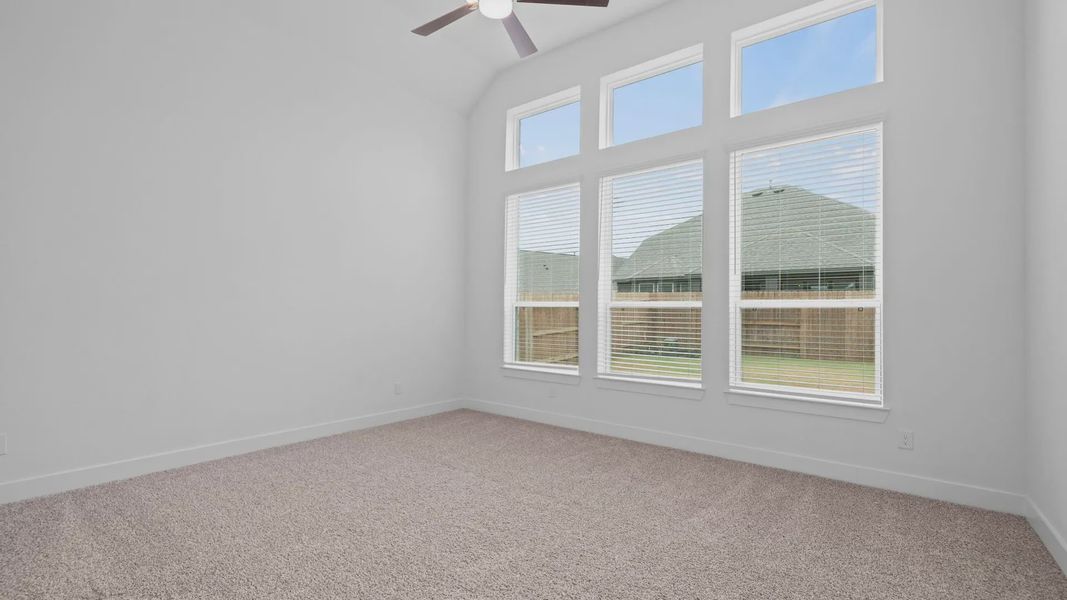 Spacious, unfurnished interior of a new home in Lakes of Cane Island, Katy (Image 20).