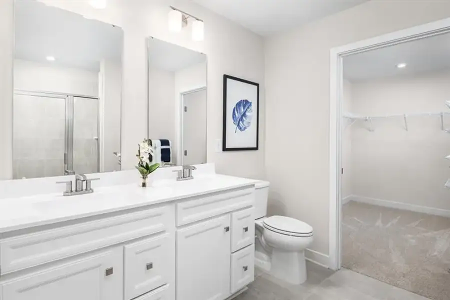 Representative furnished interior of a home built from the Nassau Cove - 3253 Edgehill Drive by Ryan Homes in Lakes at Riverbend, Navassa (Image 13).
