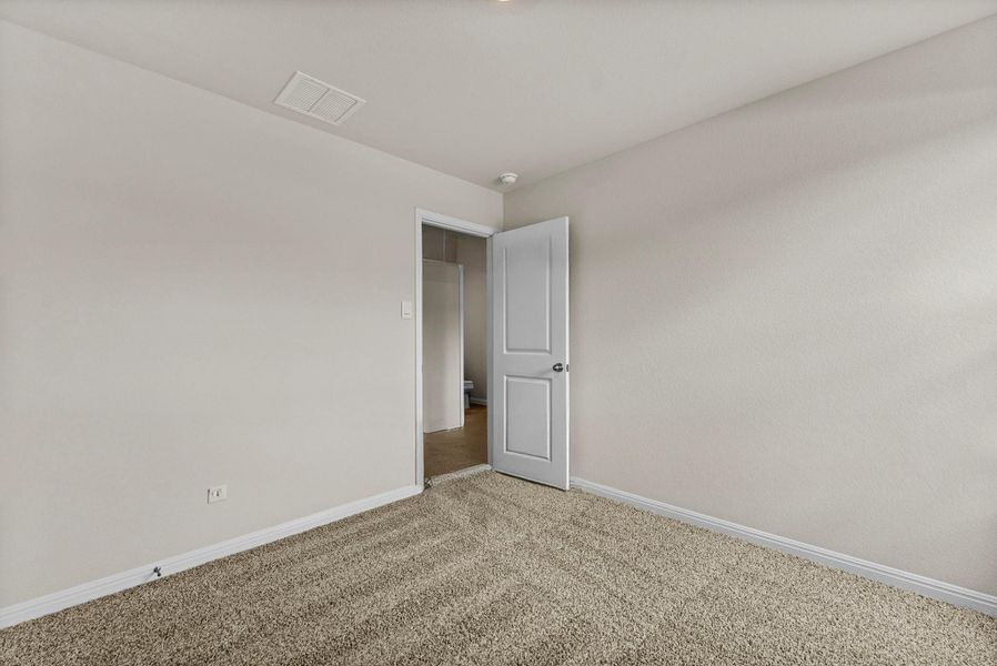 Spacious, unfurnished interior of a new home in Whisper South, San Marcos (Image 22).