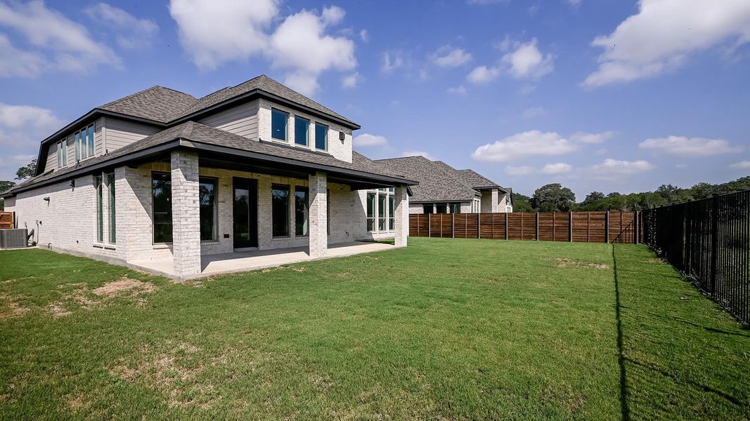 Exterior details and patio area of a home in Juniper Springs, Lockhart (Image 19).