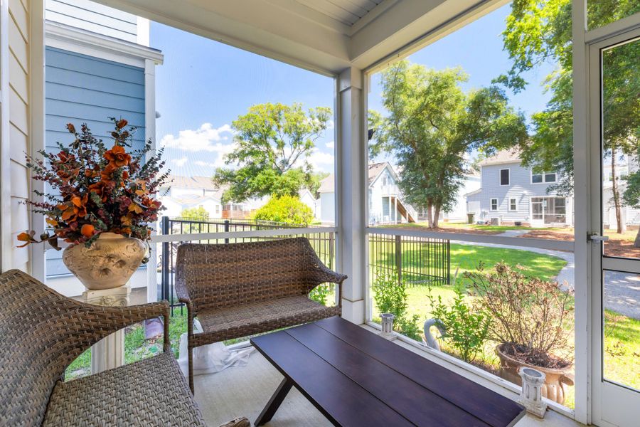 Exterior details and patio area of a home in Oak Bluff, Charleston (Image 24).