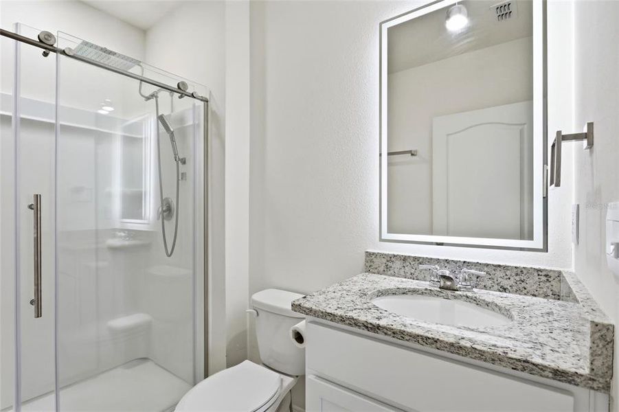 Furnished interior view inside a new home in Cascades, Davenport (Image 17).