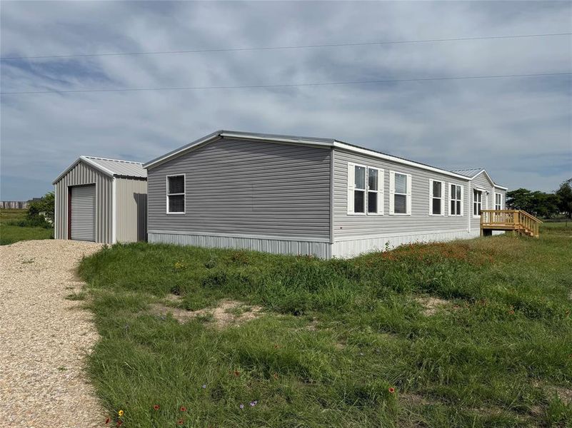 Exterior details and patio area of a home in , Weatherford (Image 13).